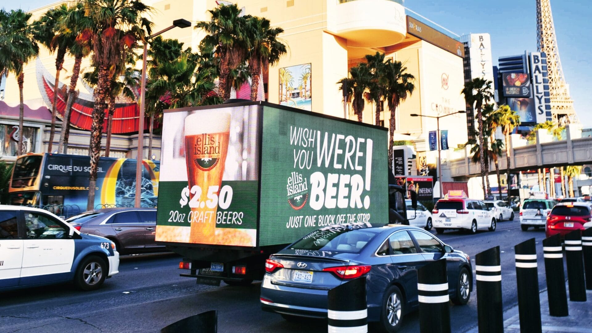 Vibrant city street with mobile beer advertisement