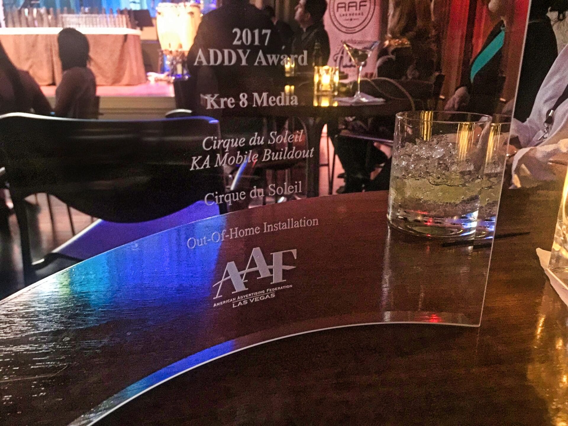 ADDY award on table at evening event.