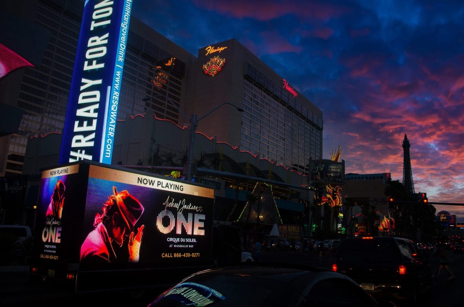 Twilight over vibrant Las Vegas Strip with neon signs.