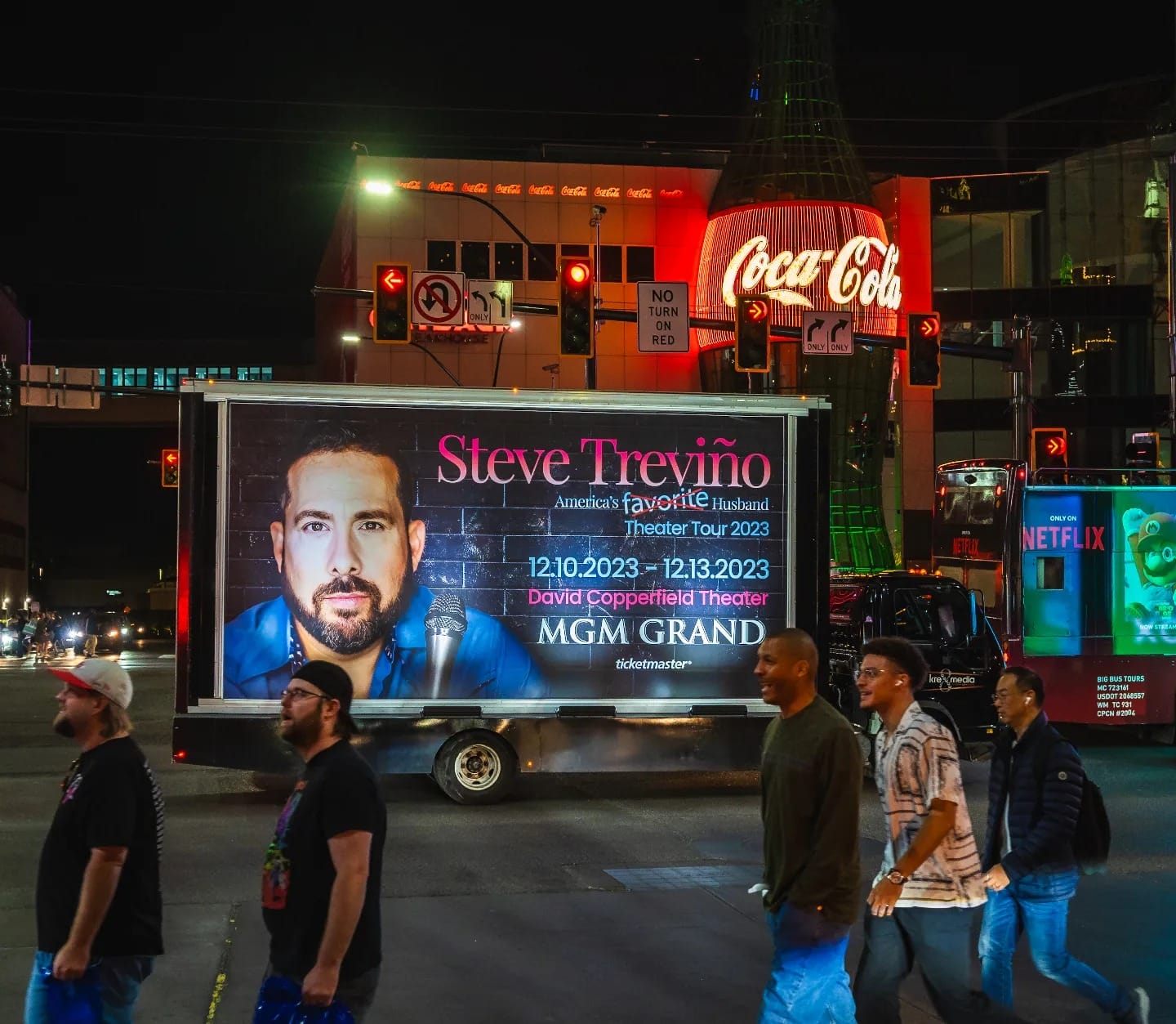 Advertisement truck for Steve Treviño tour at night.